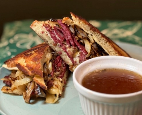 A St. Patty'd Melt sandwich with classic corned beef and cabbage